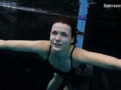 KiloLesbians presents: Beautiful girl swims and smiles underwater