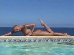 KiloLesbians presents: Blonde strips from bikini and takes a dip