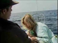 KiloLesbians presents: Babe on a boat sucking a hot cock