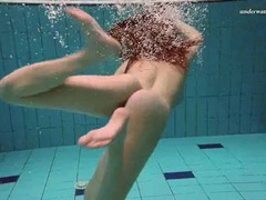KiloLesbians presents: Underwater with a busty naked babe as she swims