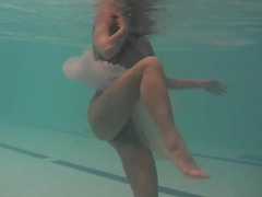 KiloLesbians presents: Sheer white dress on a teen swimming in the pool
