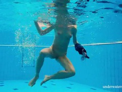 KiloLesbians presents: Teen strips off her dress as she goes for a swim