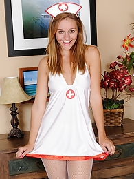KiloLesbians presents: Slutty and horny teen nurse Chandler Fay strips naked