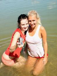 KiloLesbians presents: Two young girls on the beach start with licking and then..
