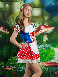 KiloLesbians presents: Very hot blonde teen beauty in an adorable outfit slowly takes it off to reveal her nice and perky boobs