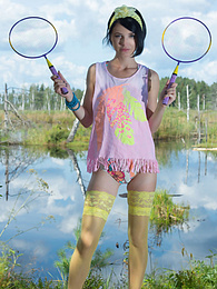KiloLesbians presents: Stunning skinny teen plays around with her body on the lap of nature with the blue sky complimenting her beauty.