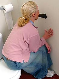 KiloLesbians presents: Blonde girl Jamie sits on the toilet and blows a black gloryhole dong