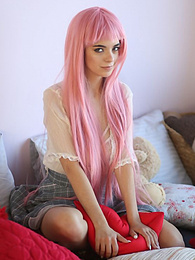 KiloLesbians presents: Teen sweetheart with a long pink hair gets nude and flashes her gorgeous breasts and pussy