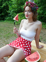 KiloLesbians presents: Nice belarusian stunner Rokki removes all clothes on a blanket in a backyard